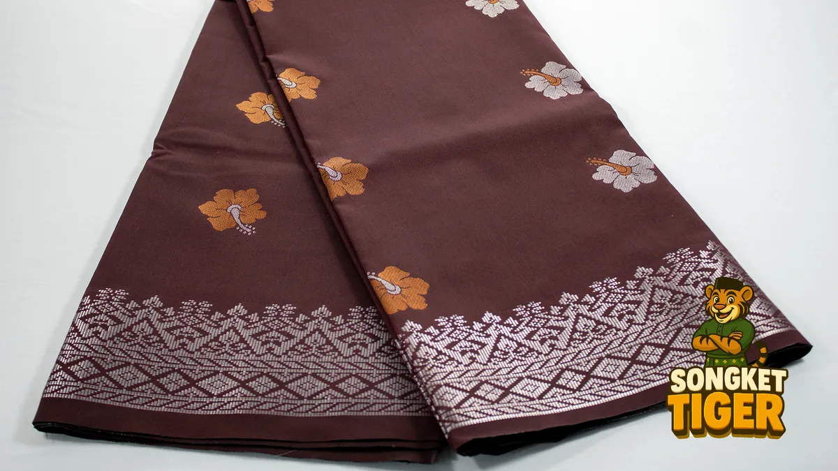 Handwoven songket fabric showing detailed thread work