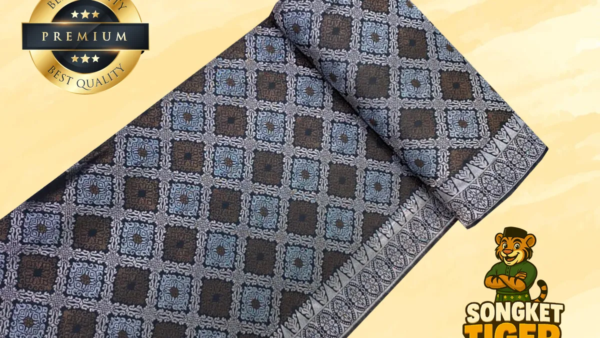 Songket fabric with elaborate gold thread pattern in traditional layout