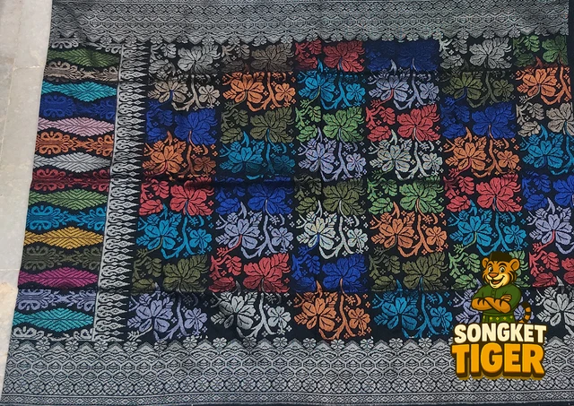 Handmade exclusive Sampin Songket design 2 by SongketTiger, richly woven with multicoloured floral and leaf motifs.
