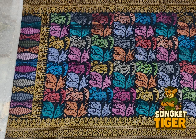 Handmade exclusive Sampin Songket design 3 by SongketTiger, richly woven with multicoloured floral and leaf motifs.