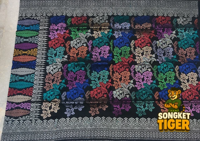 Handmade exclusive Sampin Songket design 4 by SongketTiger, richly woven with multicoloured floral and leaf motifs.