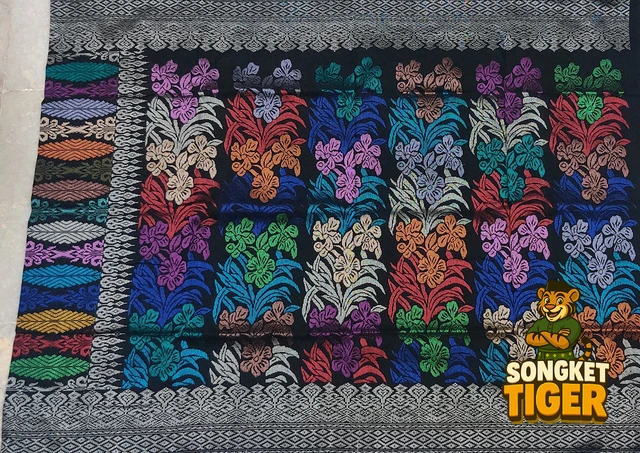 Handmade exclusive Sampin Songket design 5 by SongketTiger, richly woven with multicoloured floral and leaf motifs.
