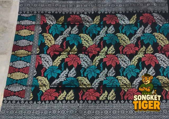 Handmade exclusive Sampin Songket design 6 by SongketTiger, richly woven with multicoloured floral and leaf motifs.
