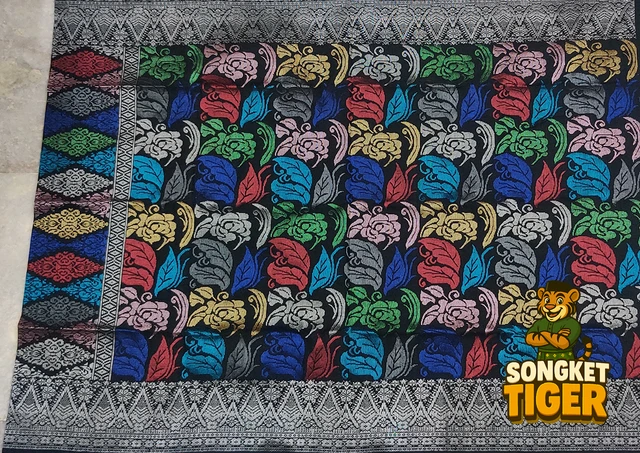 Handmade exclusive Sampin Songket design 7 by SongketTiger, richly woven with multicoloured floral and leaf motifs.