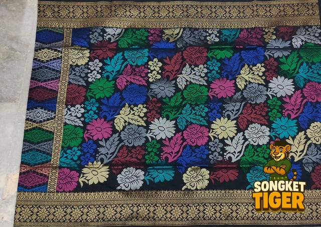 Handmade exclusive Sampin Songket design 9 by SongketTiger, richly woven with multicoloured floral and leaf motifs.