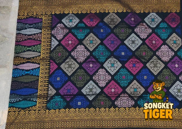 Handmade exclusive Sampin Songket design 10 by SongketTiger, richly woven with multicoloured floral and leaf motifs.