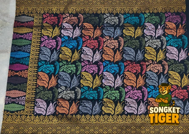 Handmade exclusive Sampin Songket design 11 by SongketTiger, richly woven with multicoloured floral and leaf motifs.