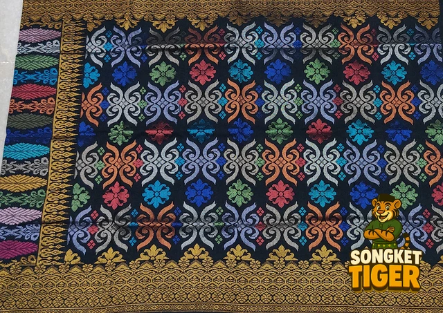 Handmade exclusive Sampin Songket design 13 by SongketTiger, richly woven with multicoloured floral and leaf motifs.