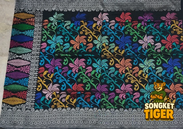 Handmade exclusive Sampin Songket design 14 by SongketTiger, richly woven with multicoloured floral and leaf motifs.