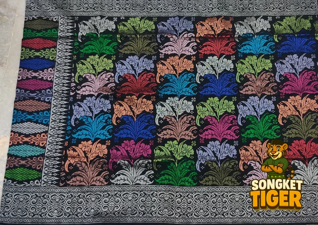 Handmade exclusive Sampin Songket design 15 by SongketTiger, richly woven with multicoloured floral and leaf motifs.