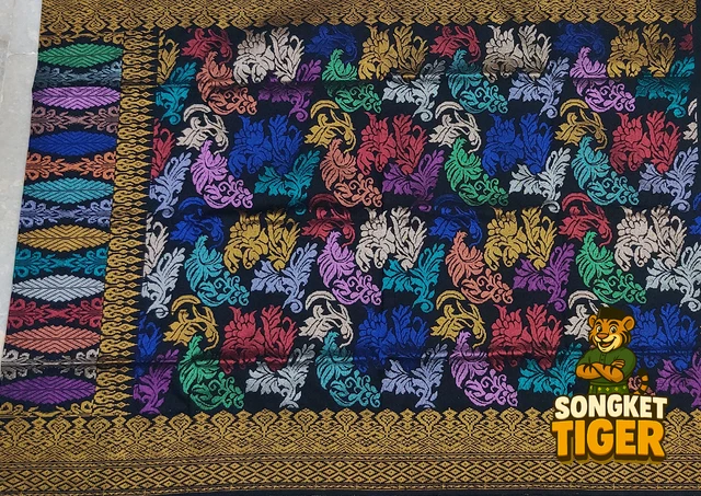 Handmade exclusive Sampin Songket design 16 by SongketTiger, richly woven with multicoloured floral and leaf motifs.